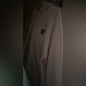 pink hoodie with a rose design